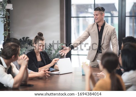 A group of business people celebrating the joy of business success