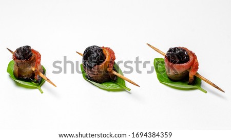 
One-pot sandwich with dried plum and bacon. Royalty-Free Stock Photo #1694384359