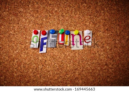 Offline - Cut out letters pinned on a cork notice board. 