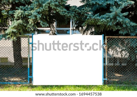 Advertising banner mockup on the fence