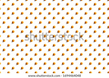 Dried lemon pattern on a white background. Food texture. Seamless texture of lemon.