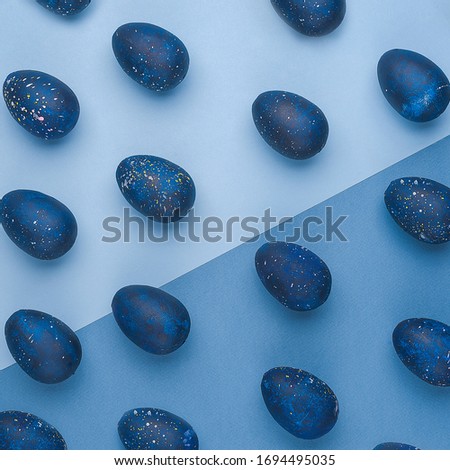 trendy Easter egg pattern of color of the year-classic blue with gradient effect. Flatley. Top view