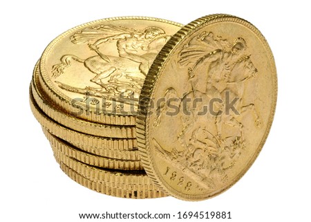 British full Sovereign gold coins isolated on white background Royalty-Free Stock Photo #1694519881