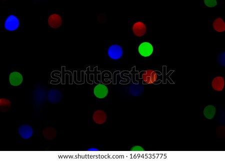 Colourful Disco Night Dark Round Bokeh Sparkling Shiny Serial Bulbs Light on Black Background