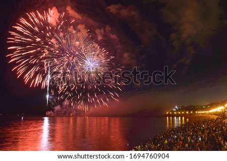 City day celebration in Khabarovsk. Fireworks over the Amur river. Far East, Russia.