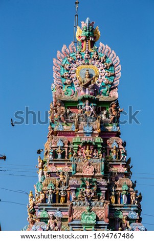 Hindu temple in Tamil Nadu, South India.  Sculptures on Hindu temple gopura (tower)
