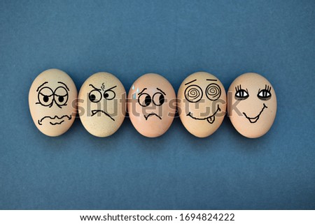 Funny eggs expressions concept with different emotions isolated on flat black background.
