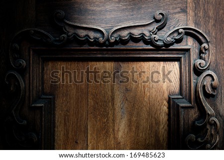 Decorative ornament on wooden door - high resolution background Royalty-Free Stock Photo #169485623
