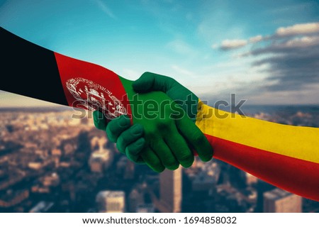 Shaking hands Afghanistan and Benin