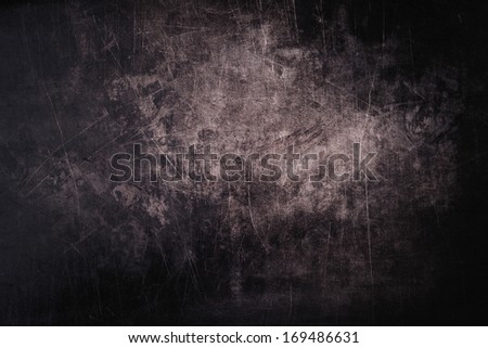 Dark grunge background with scratches Royalty-Free Stock Photo #169486631