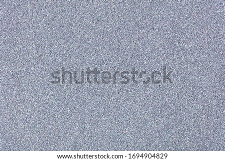 New grey glitter background, texture in excellent tone for elegant design view. High resolution photo.