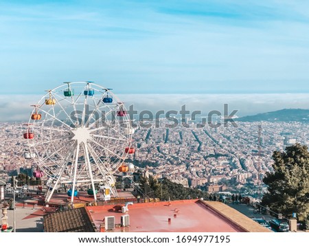 Beautiful view from the top of mountain Tibidabo, Barcelona. Traveling in Spain. Concept of tourism and leisure.