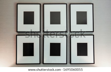 Set of white modern frame on the wall. Abstract background for creative art design and interior decoration. Black frame on white frame.