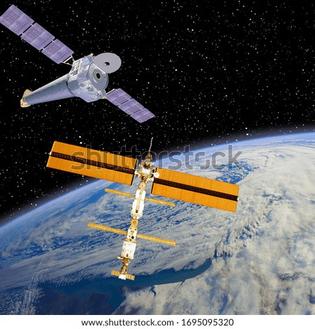 Space station. Spaceships above the earth. The elements of this image furnished by NASA.
