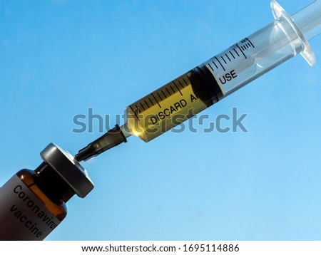 In this photo illustration vial labelled Coronavirus vaccine and syringe are seen on display. The world is anxiously awaiting for a vaccine against coronavirus. 