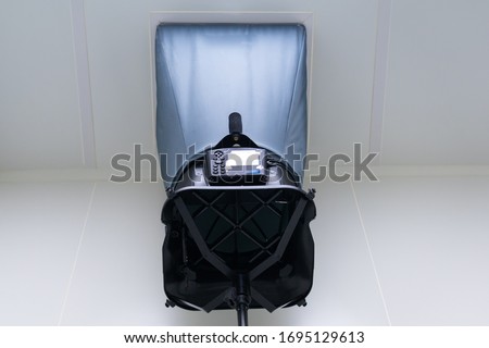 The operator is using the capture hood balometer to measuring the air velocity and volume of supply air from HVAC system in the clean room of pharmaceutical clean area.  Royalty-Free Stock Photo #1695129613
