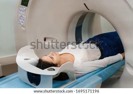 Computed tomography of the pelvis and hard tissues for women. CT scan to cure tissue diseases. Professional diagnosis of the organs of a young girl Royalty-Free Stock Photo #1695171196