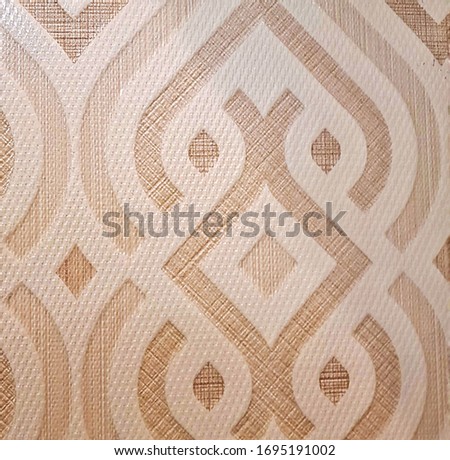 Beige ceramic tile  with abstract pattern for wall and floor decoration. Concrete stone surface background. Vintage texture with ornament for interior design project.