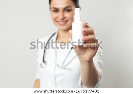 Female pediatrician posing for camera in hospital stock photo. Pediatrics concept