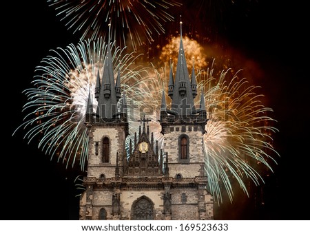Tyn Church in Prague on the background of the New Year fireworks