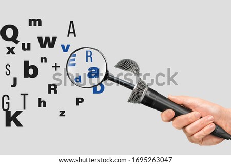 journalist holds microphone in interview and from the microphone comes a magnifying glass that focuses on letters that form the word truth.