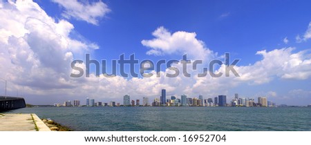 Skyline of Miami, Florida. Large panorama with stunning details. Blue sky with massive cloud formations on a sunny summer's day.