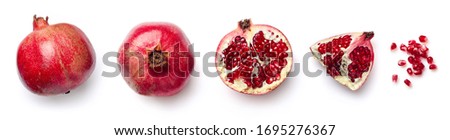 Fresh whole and half of pomegranate isolated on white background from top view Royalty-Free Stock Photo #1695276367