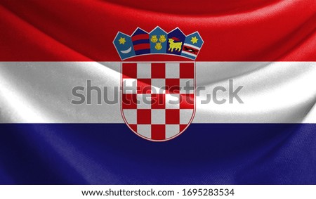 Realistic flag of Croatia on the wavy surface of fabric