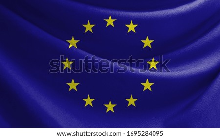 Realistic flag of European Union on the wavy surface of fabric