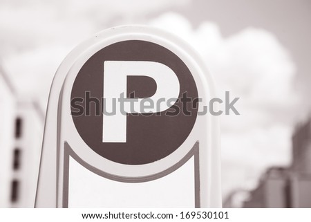 Parking Sign in Urban Setting