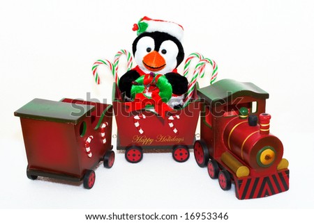 Holiday Penguin and candy canes in Happy Holiday candy cane train on white background