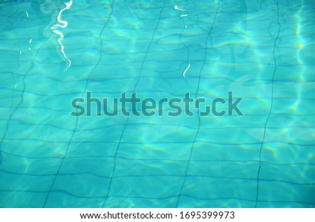 background of blue water in the pool