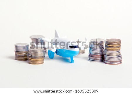 Miniature plane, a lot of coins around.
