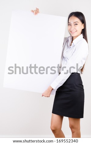 Young asian business women show empty board