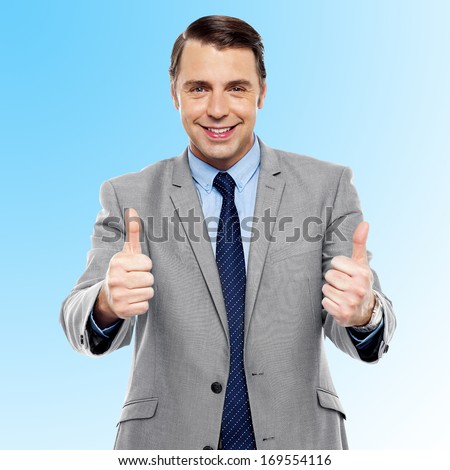 Successful entrepreneur showing double thumbs up