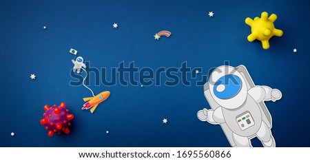 International day of human space flight. 12 April World Cosmonautics Day. Astronaut explores space on a blue isolated background. The concept of distant galaxies and deep space.