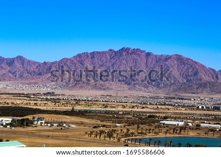 Eilat city against the background of the Jorden mountains