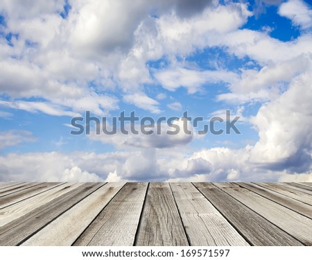 wood floor with cloud and blue sky