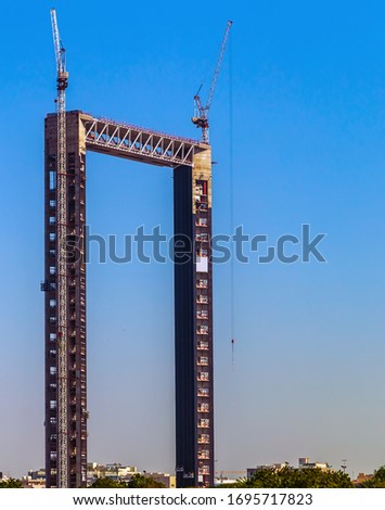 Dubai Frame architectural landmark biggest build tower crane picture frame created out of glass steel aluminum and reinforced concrete