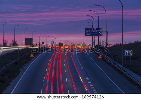 Traffic signals in an spanish road at night. Night traffic