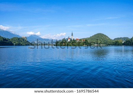 Amazing view on Bled Lake with church dedicated to the Assumption of Mary on a small island, Julian Alps, Slovenia