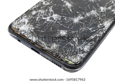 Closeup of Modern mobile smart phone with broken, cracked screen isolated on white background. Select focus and clipping path for use