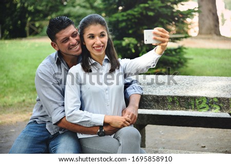 Happy Couple Taking Funny Selfies	
