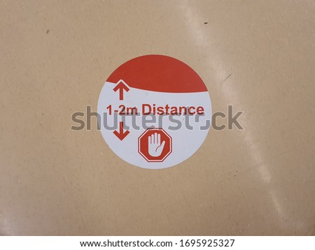 1-2M Distance Sign on Store Floor for Social Distancing during Coronavirus Covid-19 2020.