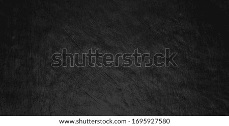 Black polished metal steel texture abstract background.