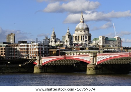 View of St Paul's Cathedral from the South Bank, with Blackfriar's Bridge and the River Thames in the foreground, taken late on a summer afternoon.