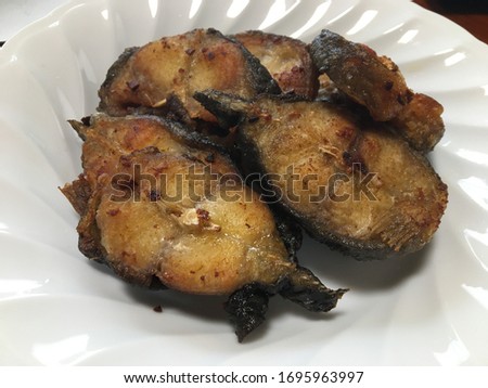 fried Catfish cut into pieces