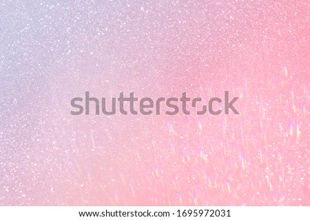 blurred glitter shiny festive background toned blue pink gradient