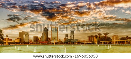 Jacksonville, Florida. Panoramic view of city downtown and brigde at dusk, USA.