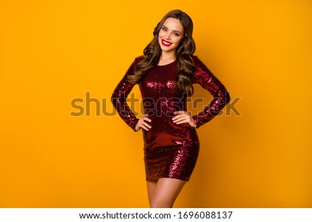 Photo of attractive wavy lady students event festive party prom dance floor good mood disco night arms by sides wear sequins red mini dress isolated yellow color background